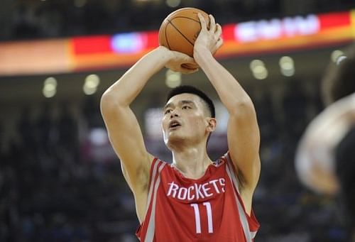 Yao Ming makes a penalty shot during a match as part of the NBA China Games, in Beijing, on October 13, 2010