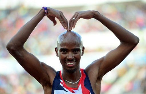 Mo Farah celebrates winning the 5000m final of the 2012 European Athletics Championships in Helsinki on June 27, 2012