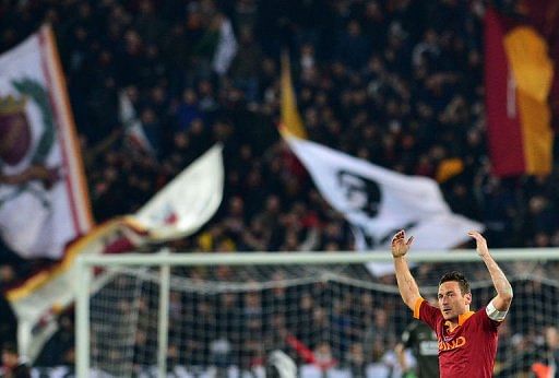 AS Roma forward Francesco Totti celebrates scoring on February 16, 2013 at the Olympic Stadium in Rome