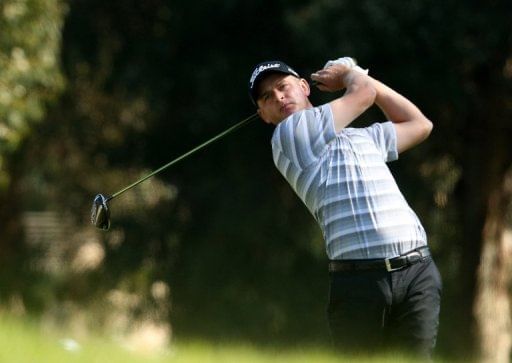 John Merrick tees off during the final round of the Northern Trust Open at Riviera Country Club on February 17, 2013