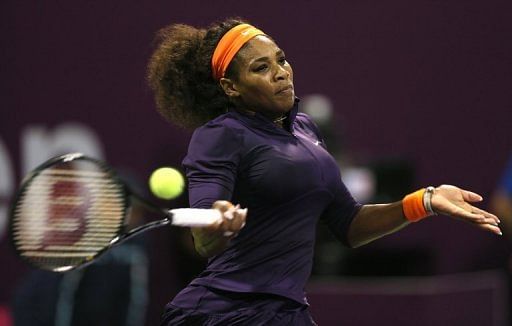 Serena Williams returns against Victoria Azarenka in their Qatar Open final in Doha on February 17, 2013