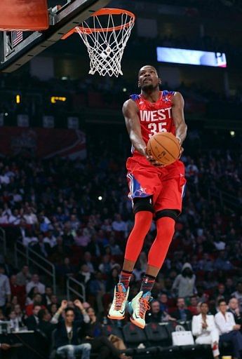 Kevin Durant goes up for a reverse dunk in the first quarter of the All-Star Game on February 17, 2013