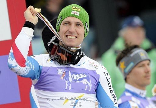 Marcel Hirscher with his gold medal on the podium after the men&#039;s slalom in Schladming, Austria on February 17, 2013