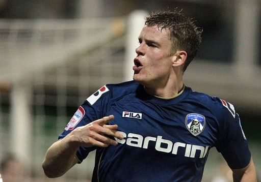 Oldham Athletic&#039;s Matt Smith celebrates scoring in Oldham on February 16, 2013