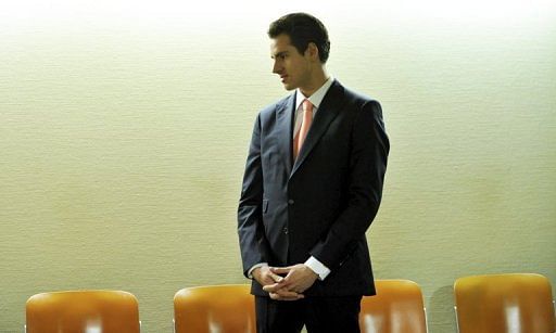 Adrian Sutil arrives at the district court in the southern German city of Munich on January 30, 2012