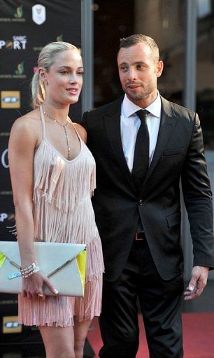Oscar Pistorius and his model girlfriend Reeva Steenkamp on November 4, 2012 in Johannesburg