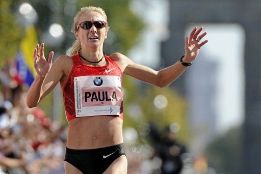 Paula Radcliffe crosses the finishing line of the women&#039;s event of the 38th Berlin Marathon on September 25, 2011