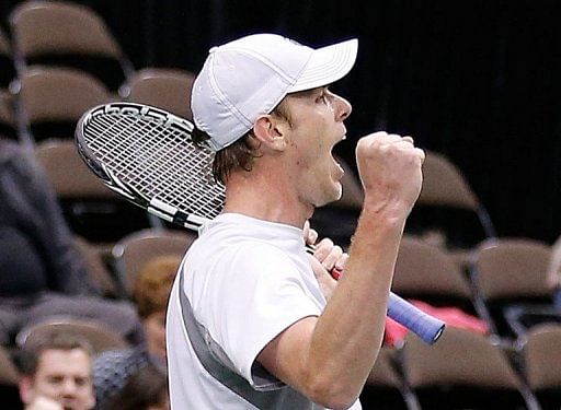 Sam Querrey of the United States celebrates winning his match against Thiago Alves, on February 3, 2013, in Florida