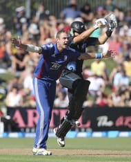 Ross Taylor (R) collides with Stuart Broad during the second one-day international, in Napier, on February 20, 2013