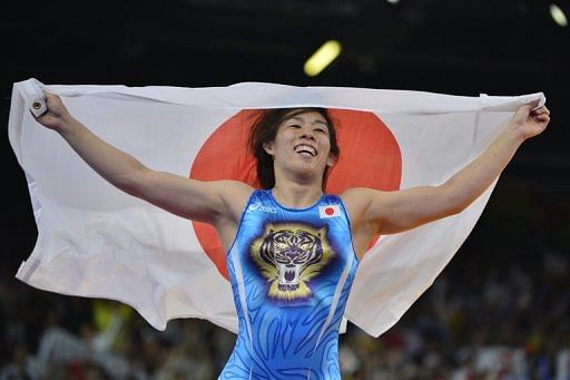 Japan&#039;s Saori Yoshida celebrates winning wrestling gold on August 9, 2012 at the London Olympics