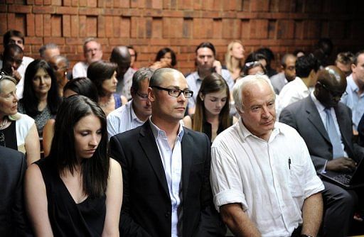 Aimee, Carl and Henke Pistorius attend the bail hearing of South African  sprinter Oscar Pistorius on February 20, 2013