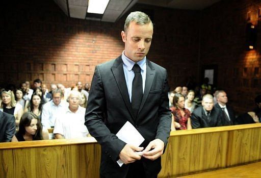 Oscar Pistorius appears on February 20, 2013 at the Magistrate Court in Pretoria