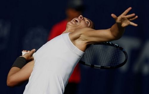 Italy's Sara Errani serves the ball at the WTA Dubai Open in the Gulf emirate on February 21, 2013