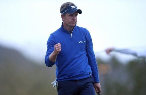 Luke Donald makes a putt to win his match 1 up in 18 holes against Marcel Siem, in Marana, Arizona, on February 21, 2013