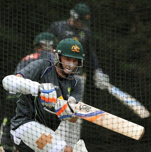 Australian Test cricketer Michael Hussey bats during a training session in Sydney, on January 2, 2013