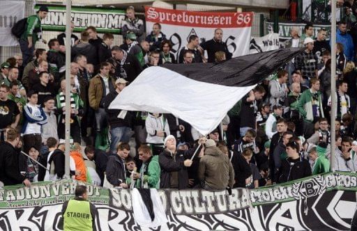 Moenchengladbach fans cheer their team against Olympique de Marseille in Marseille on November 8, 2012