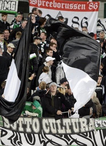 Moenchengladbach fans cheer their team against Olympique de Marseille in Marseille on November 8, 2012