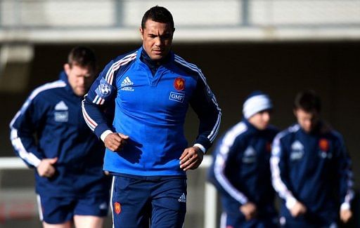 Thierry Dusautoir warms upduring a training session on February 21, 2013 in Marcoussis, south of Paris