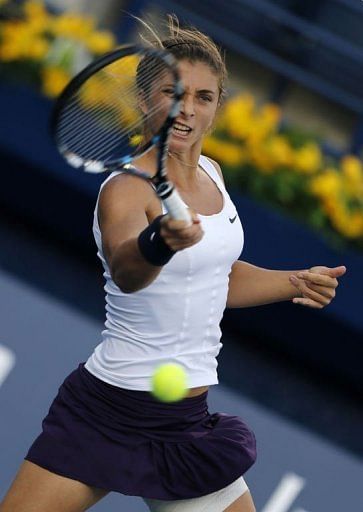 Italy's Sara Errani returns the ball on February 22, 2013