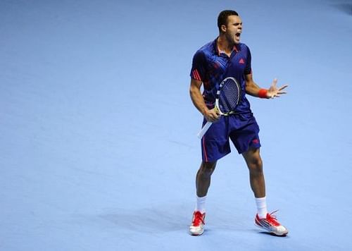 France's Jo-Wilfried Tsonga reacts after a point in London on November 7, 2012