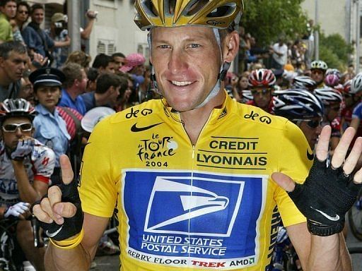 Lance Armstrong celebrates his sixth successive victory in the Tour de France, on July 25, 2004