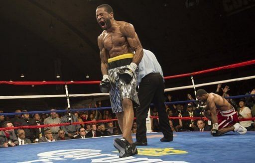 Lamont Peterson knocked down Kendall Holt in the sixth round, on February 22, 2013, before stopping him in the eighth