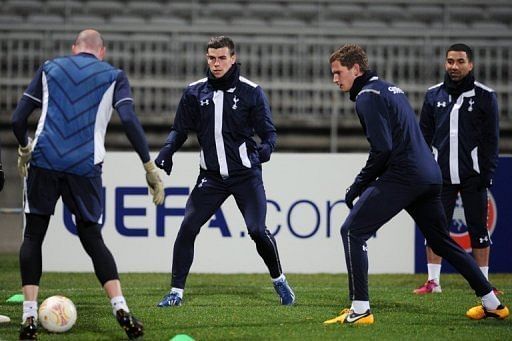 Tottenham players hold a training session on February 20, 2013 at the Gerland stadium in Lyon, France