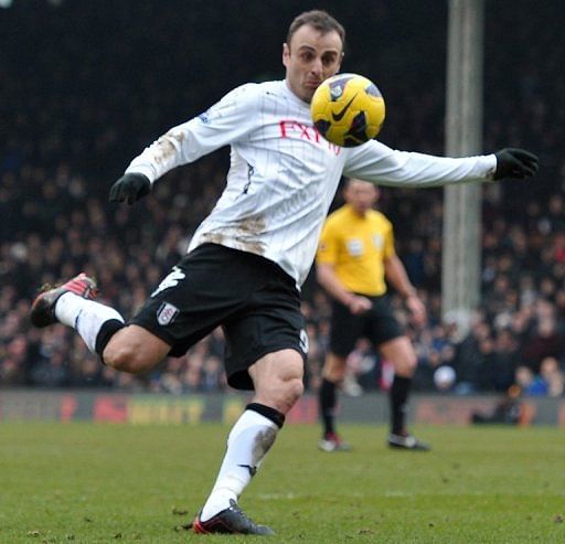 Fulham&#039;s Dimitar Berbatov prepares to shoot to score the only goal of the game at Craven Cottage on February 23, 2013