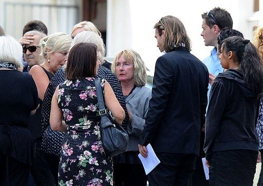 June Steenkamp (C), mother of the late South African model Reeva Steenkamp, in Port Elizabeth on February 19, 2013