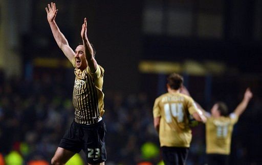 Rory McArdle celebrates at Aston Villa on January 22, 2013 after Bradford City held on to reach the League Cup final