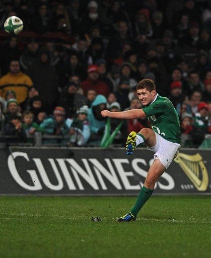 Ireland&#039;s Paddy Jackson takes a kick during a rugby union match against Fiji, in Limerick, on November 17, 2012