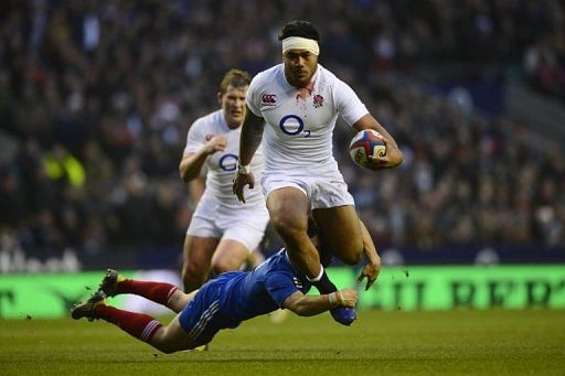 England centre Manu Tuilagi breaks through the French defence at Twickenham on February 23, 2013