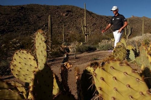 Webb Simpson walks between holes during the quarter-final of the WGC Match Play Championship on February 23, 2013