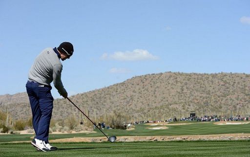 Hunter Mahan hits a tee shot during the final round of the World Golf Championships, February 24, 2013 in Arizona