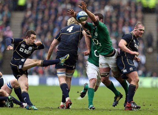 Ireland&#039;s Donnacha Ryan charges down the kick of Scotland&#039;s Greig Laidlaw in Edinburgh on February 24, 2013