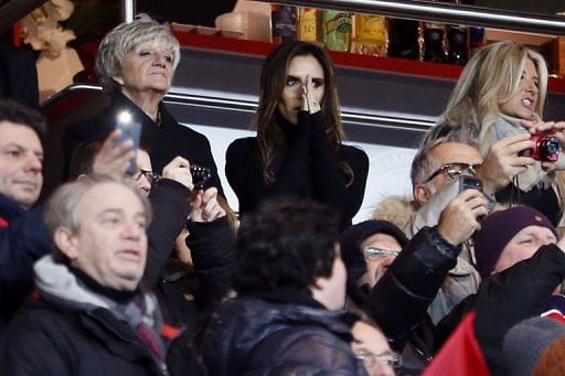 The wife of David Beckham, Victoria Beckham watches the Paris Saint-Germain match against Marseille on February 24, 2013