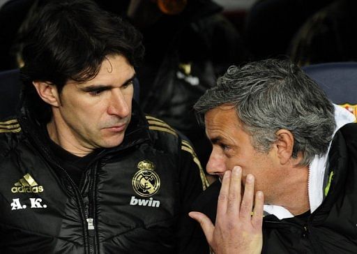Jose Mourinho (right) chats to Aitor Karanka during an earlier Clasico in Barcelona on January 25, 2012