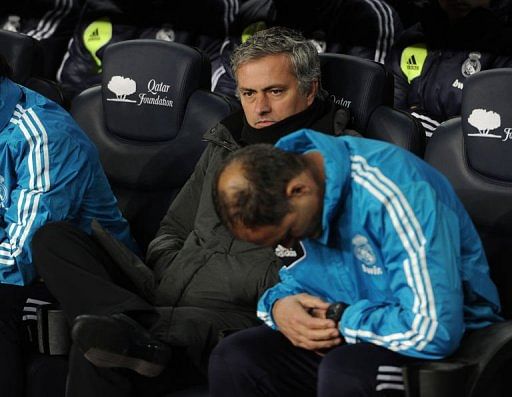 Real Madrid&#039;s coach Jose Mourinho (C) is pictured before the match in Barcelona on February 26, 2013