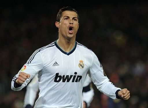 Real Madrid&#039;s Cristiano Ronaldo celebrates after scoring in Barcelona on February 26, 2013