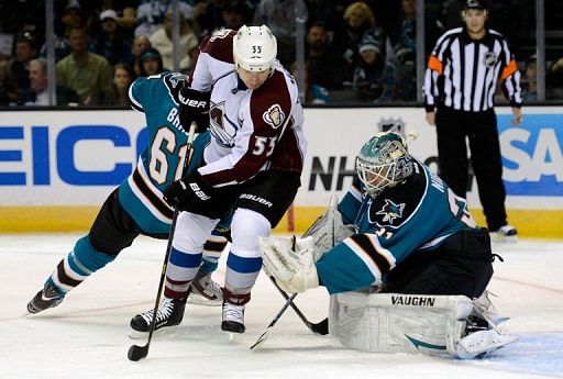 Goalkeeper Antti Niemi (R) of the San Jose Sharks defends the goal, in San Jose, California, on February 26, 2013