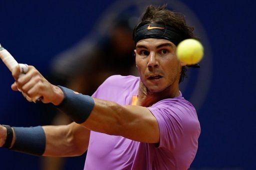 Rafael Nadal returns a ball to David Nalbandian during the Brazil Open final in Sao Paulo on February 17, 2013