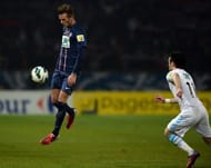Paris Saint-Germain's David Beckham controls the ball on February 27, 2013 at the Parc des Princes