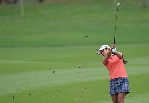 Ai Miyazato of Japan plays a shot during the final round of the Thailand golf tournament in Pattaya on February 24, 2013