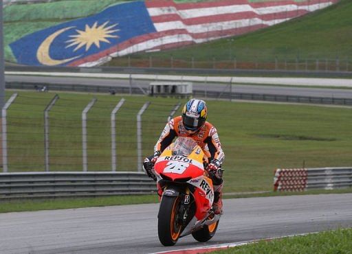 Honda&#039;s Dani Pedrosa during a pre-season test session at the Sepang circuit outside Kuala Lumpur on February 28, 2013