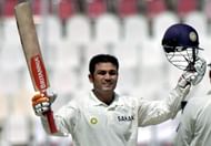 MULTAN, PAKISTAN: Indian batsman Virender Sehwag celebrates after scoring his triple century during the second day of the first Test match between Pakistan and Indian in Multan, 29 March 2004.