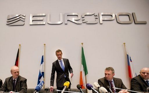  Europolâs chief Rob Wainwright (2nd left) arrives for a press conference in The Hague today. European police warned Monday that the integrity of football was at stake, as they revealed they had smashed a criminal network fixing hundreds of matches, including in the Champions League and World Cup qualifiers.