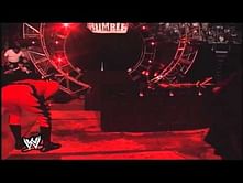 Video: Kane sets the Undertaker's casket on fire