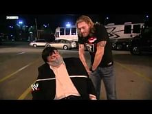 Video: Edge mows down fake Paul Bearer with a car