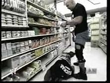 Video: Stone Cold beats Booker-T in a super market