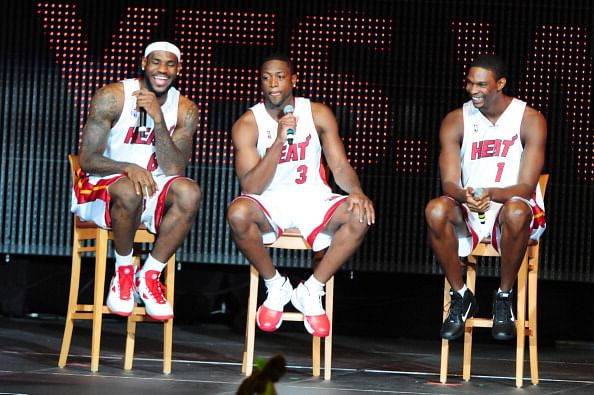 (L-R) LeBron James, Dwyane Wade and Chris Bosh attend HEAT Summer of 2010 Welcome Event at AmericanAirlines Arena on July 9, 2010 in Miami, Florida. 